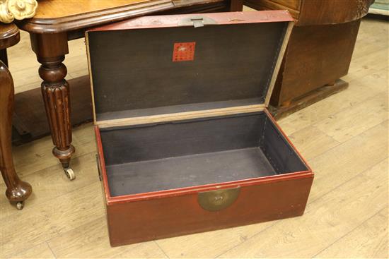 A Chinese red lacquered chest W.75cm